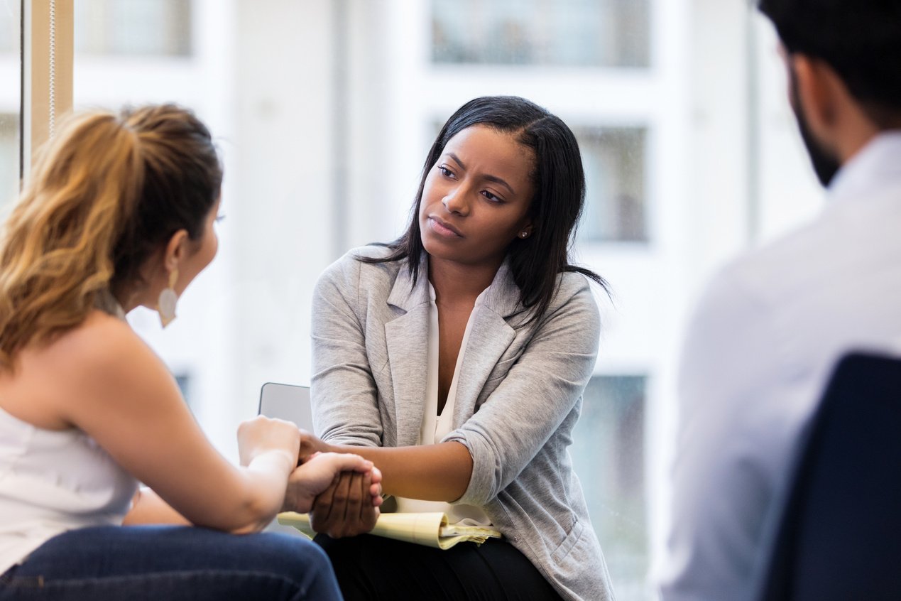 Compassionate counselor listens to client